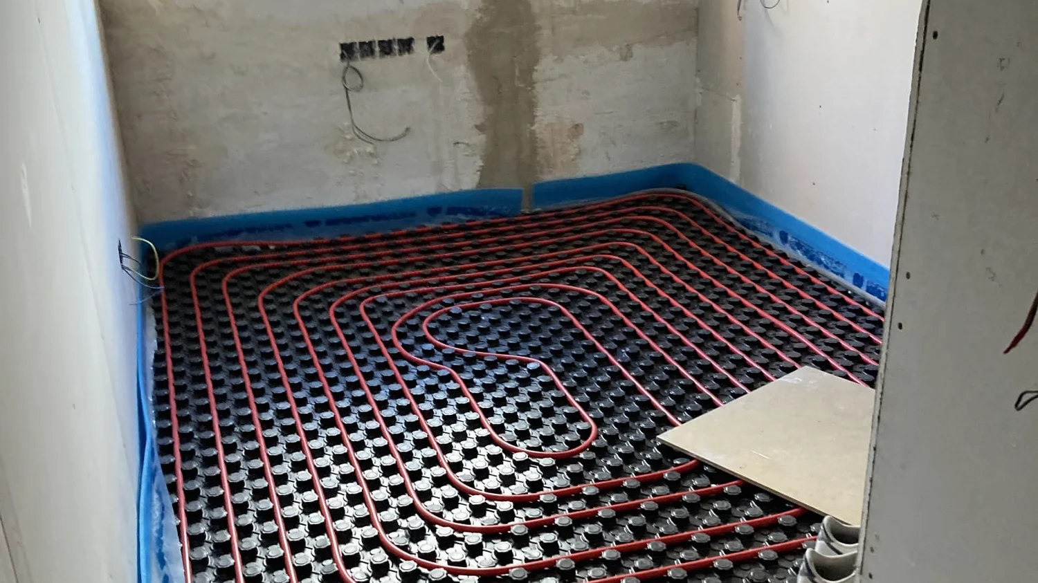 Instalación de suelo radiante · CM2 Obras y Construcciones